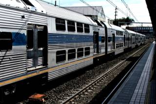 Minimalizacja kosztów związanych z opóźnieniami pociągów w obszarach sieci kolejowej